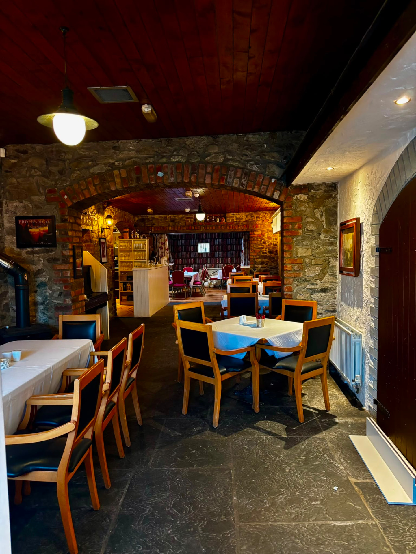 Stone and brick archway into the dining room